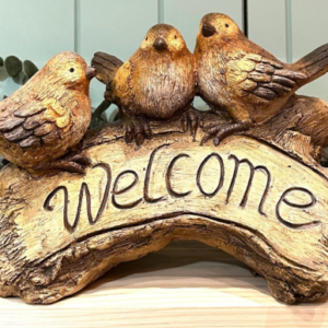 Three Cute Birds sat on a Welcome